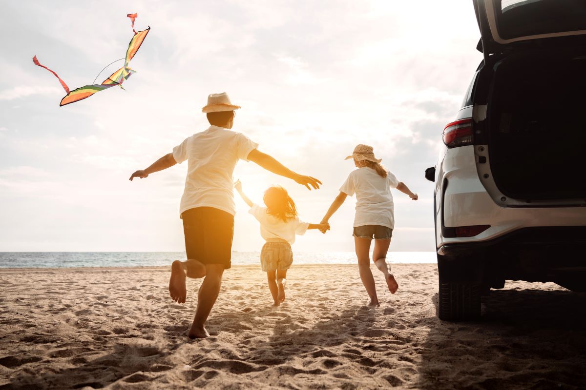 Family having fun together on a beach
